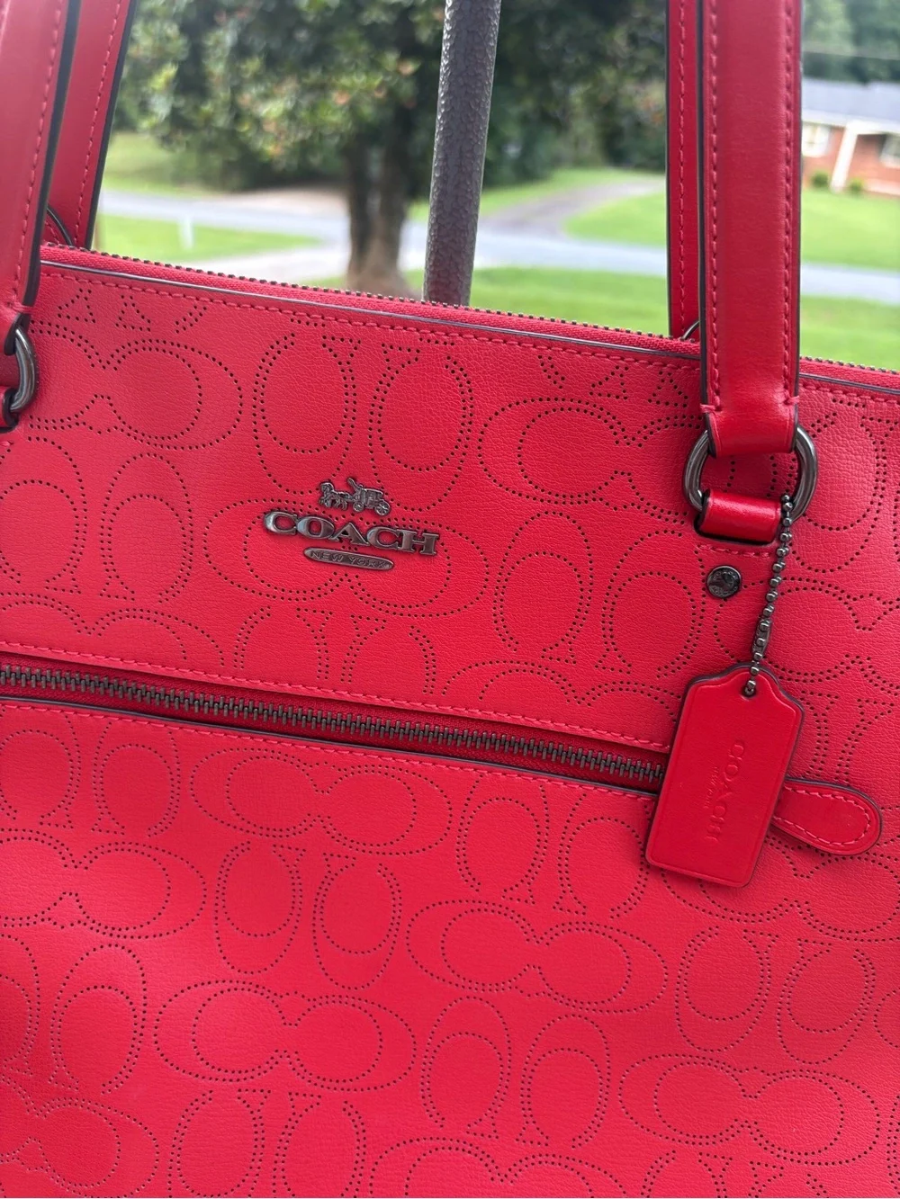 Coach red signature